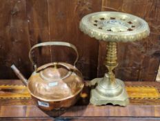 19th century copper kettle with brass handle together with a 19th century copper trivet stand