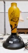 Galle style cameo orange glass lamp decorated with a butterfly and foliage, 46cm high