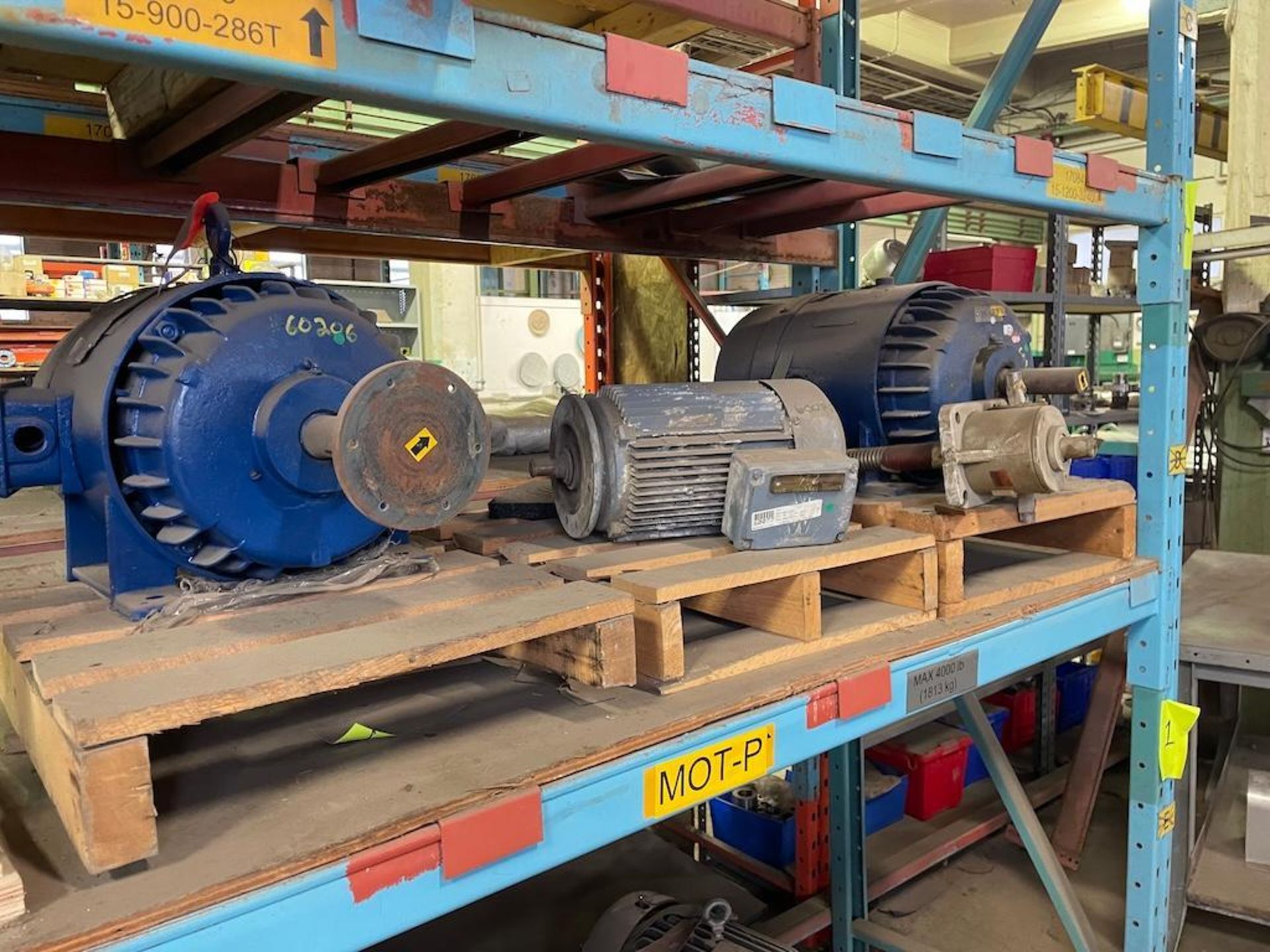 LOT SECTION OF RACKING W ASSORTED PARTS OF PUMPS, MOTORS, VALVES [SHOP]