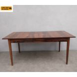 A mid-century Santos rosewood extending dining table by Robert Heritage for Archie Shine having a