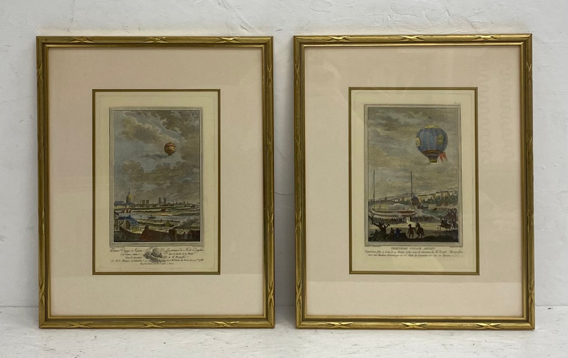 A pair of French 18th century hand coloured engravings depicting early hot air balloon flights by