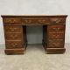 A C.1900 oak twin pedestal desk in three sections with blue leather lined top over an arrangement of - Image 1 of 6