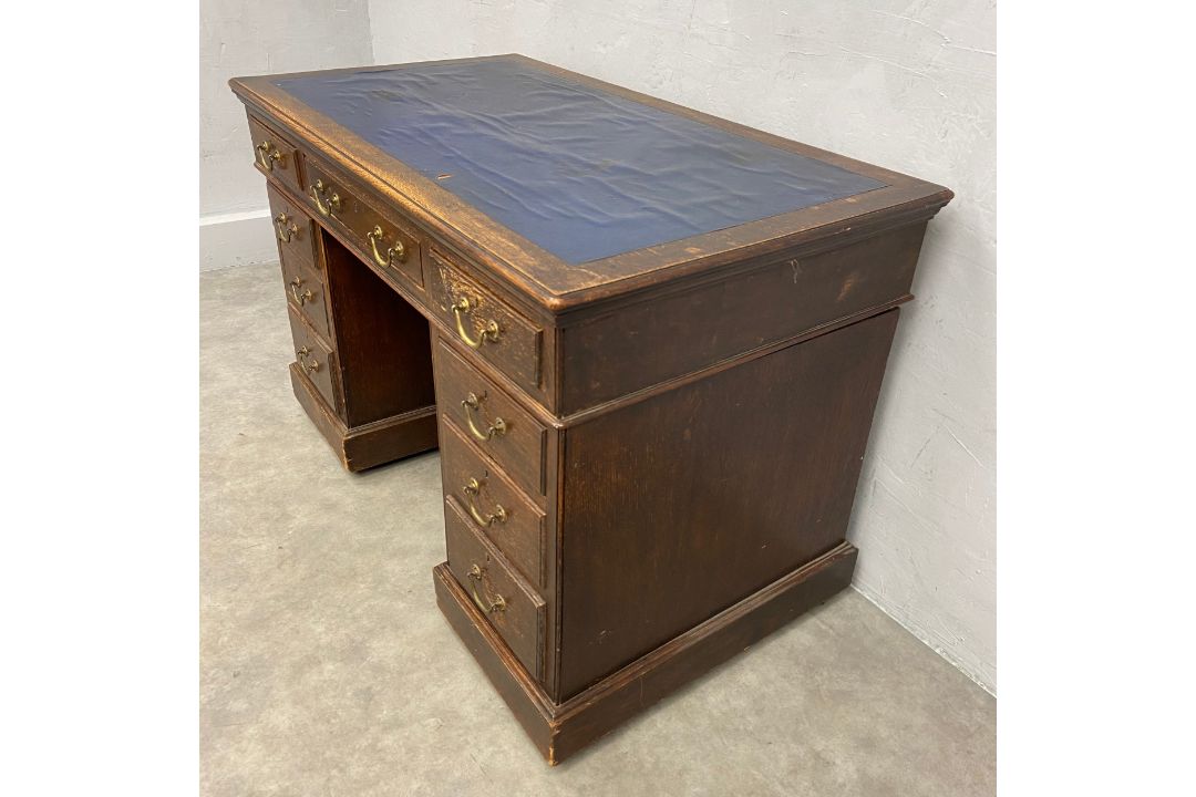 A C.1900 oak twin pedestal desk in three sections with blue leather lined top over an arrangement of - Image 4 of 6