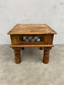 A vintage Indian hardwood side table with square riveted top over the wrought iron open