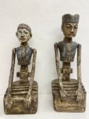 A pair of 20th century hand carved and painted Javanese matrimonial Loro Blonyo or inseparable