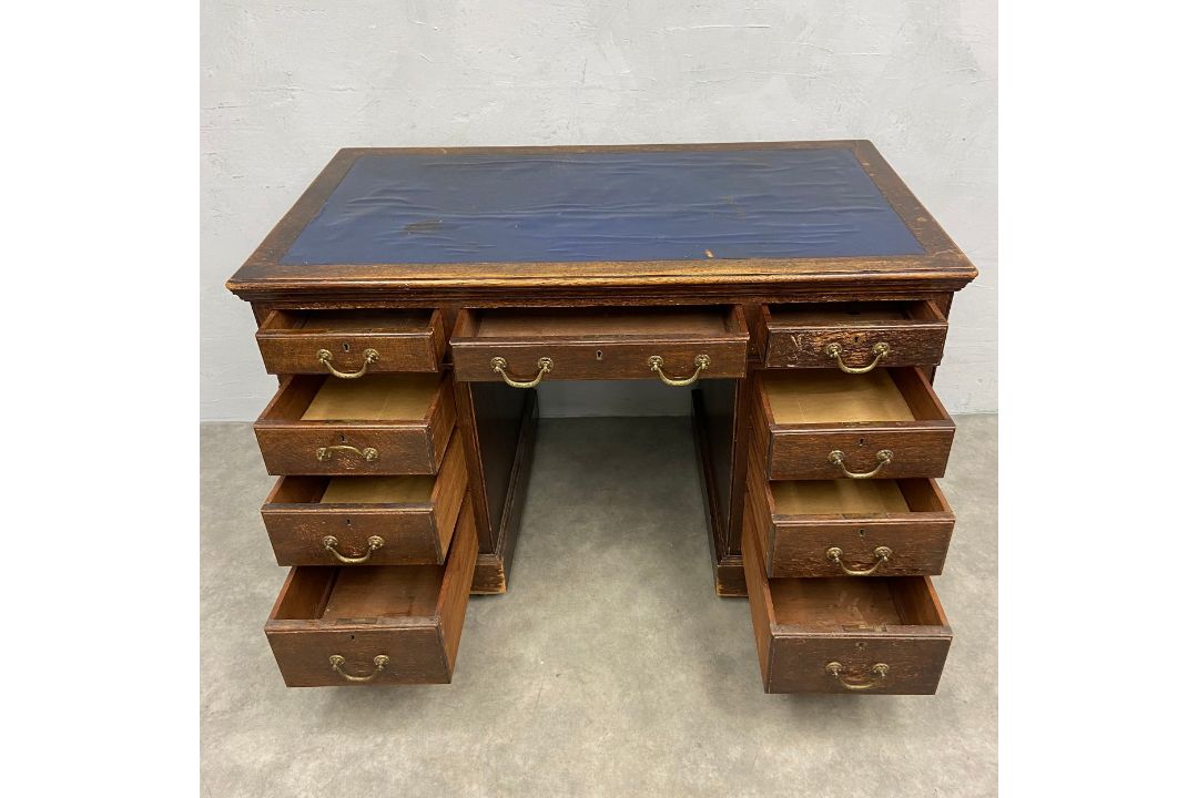 A C.1900 oak twin pedestal desk in three sections with blue leather lined top over an arrangement of - Image 3 of 6