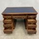 A C.1900 oak twin pedestal desk in three sections with blue leather lined top over an arrangement of - Image 3 of 6