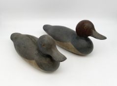 A pair of vintage hand carved and painted decoy ducks. L.35cm each