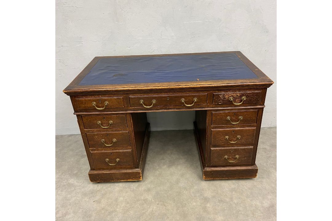 A C.1900 oak twin pedestal desk in three sections with blue leather lined top over an arrangement of - Image 2 of 6