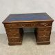 A C.1900 oak twin pedestal desk in three sections with blue leather lined top over an arrangement of - Image 2 of 6