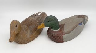 Two vintage hand carved and painted wood decoy ducks titled 'Mallard drake' and 'Mallard' 1989 by