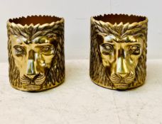 A pair of contemporary gold painted figural lion's head ice buckets. H26cm.
