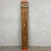 A large traditional Japanese Koto instrument with thirteen strings over a carved and shaped hardwood