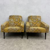 A pair of contemporary Hollandez armchairs of square angular form with brightly patterned needlework