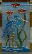 A contemporary Art Nouveau style double-glazed stained glass window pane with stylised figural heron
