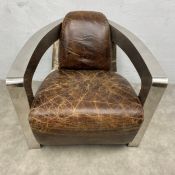 A vintage Art Deco style Halo Mars club armchair with distressed brown leather upholstered back