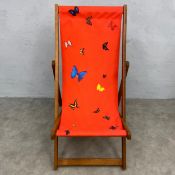 Damien Hirst (b.1965), a contemporary limited edition 'Red Butterfly' deck chair with screen printed