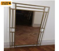 A contemporary metal framed wall mirror. 96x70cm.