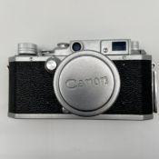A 1950s vintage Japanese metal cased bottom-loading Canon Camera Company Inc. series IV SB