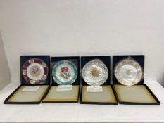 A set of four American commemorative White House Dinner Collection china plates each being