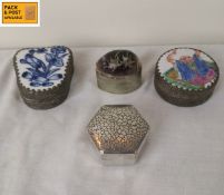 Two early to mid 20th century Oriental metal trinket boxes inset with hand painted porcelain lids