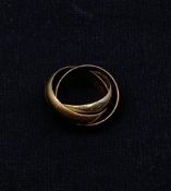 A vintage hallmarked 9ct white, yellow and rose gold Cartier style trinity ring. Weight: 5.87g