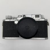 A 1950s vintage Japanese metal cased bottom-loading Canon Camera Co. Inc. series IV SB Rangefinder