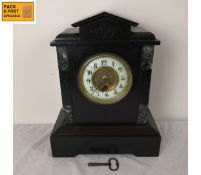A 19th century slate mantel clock of architectural form, with key. 37x29cm.