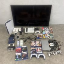 A mixed lot of vintage and contemporary gaming and other electrical equipment to include a
