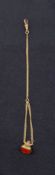 C1900 9ct hallmarked gold pocket watch fob chain with red stone inset in a gold plated fob seal.