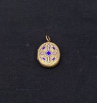 An antique engraved yellow metal and royal blue enamelled quatrefoil lcoket pendant. Tests