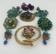Mixed costume jewellery to include a serpent bangle marked Cartier (after) three sets of clip-on