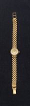 A vintage late 1950s ladies 9ct hallmarked gold Omega cocktail wristwatch with champagne dial and