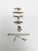 A mixed lot to include five 9ct hallmarked gold brooches together with a yellow metal example.