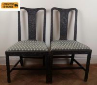 A pair of Georgian carved oak dining chairs with drop in tapestry seats. Seat height 45cm.