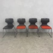 A set of four mid-century German bentwood dining chairs with velour upholstered seats raised on