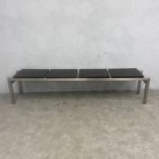 A contemporary B&B Italia bench with laminate panelled top raised on a square stretchered brushed
