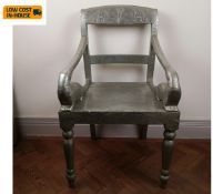 An Eastern 19th century style armchair, metal clad with incised decoration. Seat height 46cm.