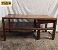 A mid-century teak McIntosh coffee table with partial undertier and two nesting side tables raised