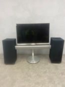 A vintage Bang & Olufsen BeoVision 7 widescreen LCD television system with integrated DVD player and