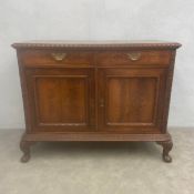 A Georgian style mahogany sideboard with granite inset top and rope moulded edge a pair of frieze