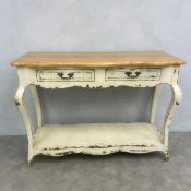 A contemporary French Provincial style side or console table in a distressed painted finish. H.86