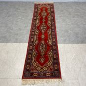 A Prado Orient Keshan Super style wool rug runner with central pole medallion and arabesque