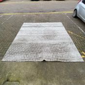 A contemporary 'Lbyrinth' carpet with repeting chevron field over a grey abrash ground by Stepevi