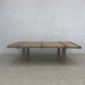 A large scratch-built coffee table with heavy iron clad plank top made from a reclaimed 19th century