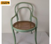 A painted Thonet style bentwood child's armchair. Seat height 34cm.