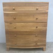 A contemporary Georgian style bowfronted chest of drawers in natural finish. H.130 W.110 D.49cm.