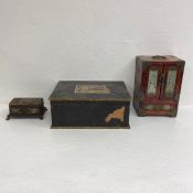 A C.1900 Ernst Plank magic lantern with black Japanned body, brass chimney and lion paw feet in