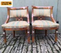 A pair of French Empire style salon chairs with ormolu mounts. H. 87cm.