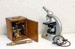 A 19th century brass monocular microscope by J & C Robbins in a fitted mahogany case with maker's